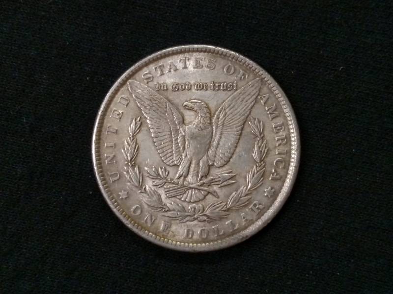 lot 13 image: 1889 Morgan Silver Dollar...