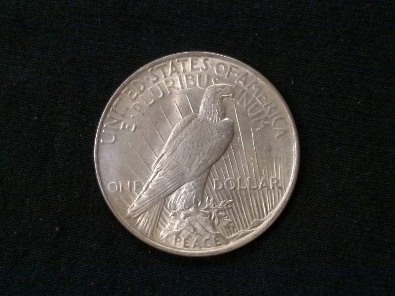 lot 20 image: 1922 Peace Silver Dollar...