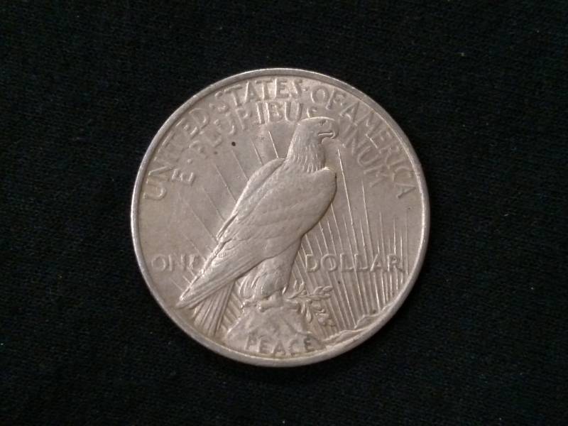 lot 23 image: 1923 Peace Silver Dollar...