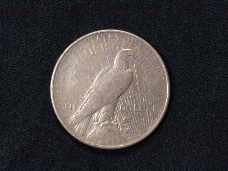 lot 24 image: 1923 D Peace Silver Dollar...