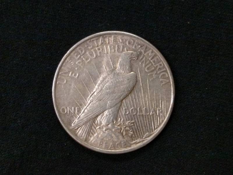 lot 26 image: 1924 Peace Silver Dollar...