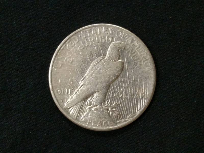 lot 28 image: 1925 S Peace Silver Dollar...