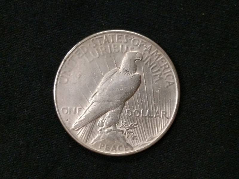 lot 31 image: 1927 S Peace Silver Dollar...