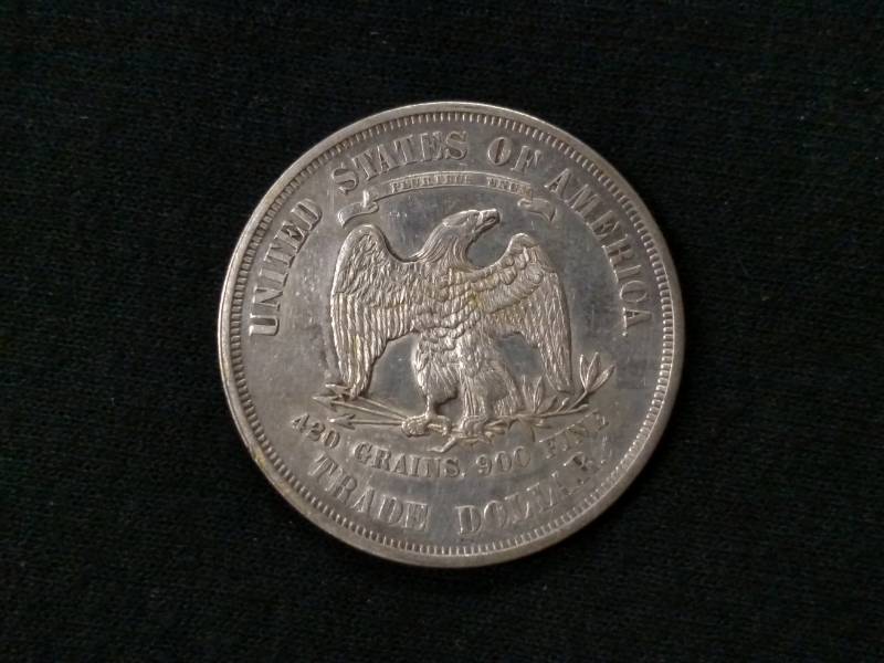 lot 5 image: 1876 AU Trade Silver Dollar...