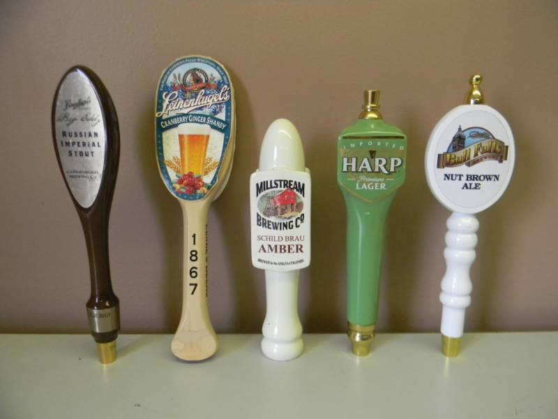 lot 43 image: COLLECTION OF 5 BEER TAP HANDLES - SEE PICTURES