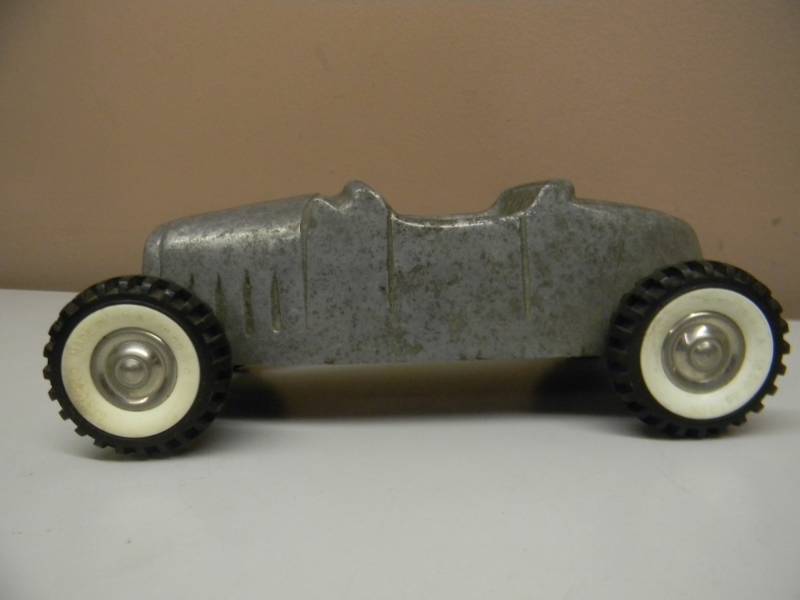 lot 11 image: AWESOME RARE VINTAGE ROADSTER STRUCTO LISTED ON TIRES VERY COOL PIECE - SEE PICTURES - COULDNT FIND ANOTHER ONE