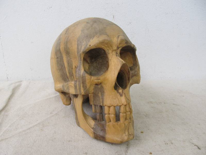 lot 39 image: Vintage Life-Sized Carved Wooden Human Skull