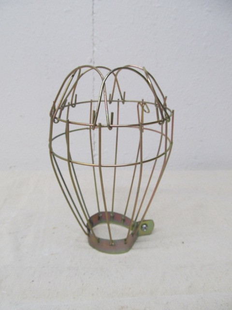 lot 68 image: Lot of 11 Decorative Brass Light Bulb Cages
