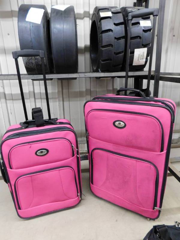 lot 79 image: Two Piece Pink Luggage Set with Duffel Bag