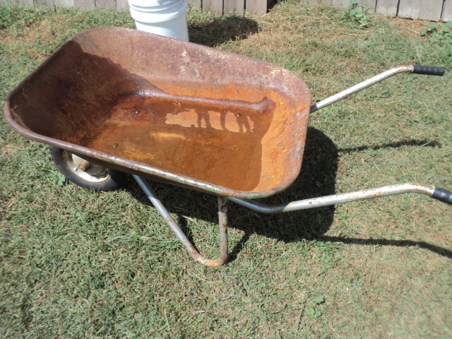lot 31 image: wheelbarrow...