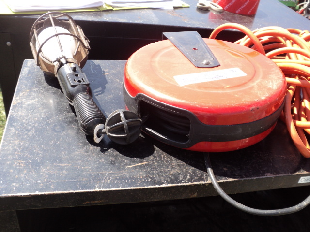 lot 34 image: extension cords and 50 reel light...