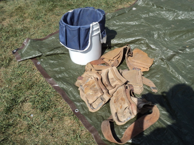 lot 43 image: tool bucket and belts...