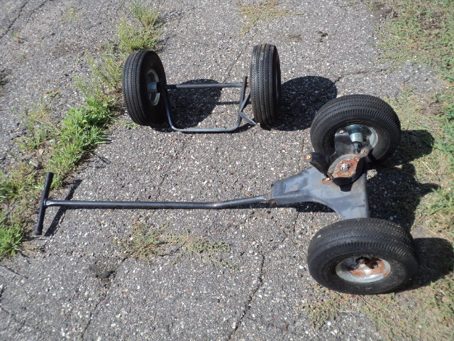 lot 48 image: barrel mower and set of wheels...