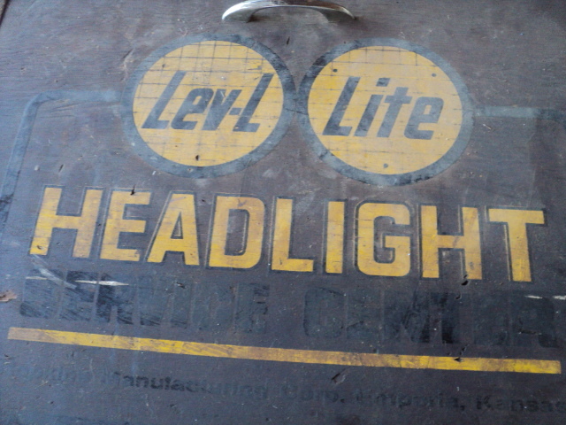 lot 57 image: vintage Lev-L Lite headlight...