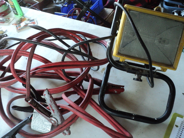 lot 64 image: jumper cables and trouble light...