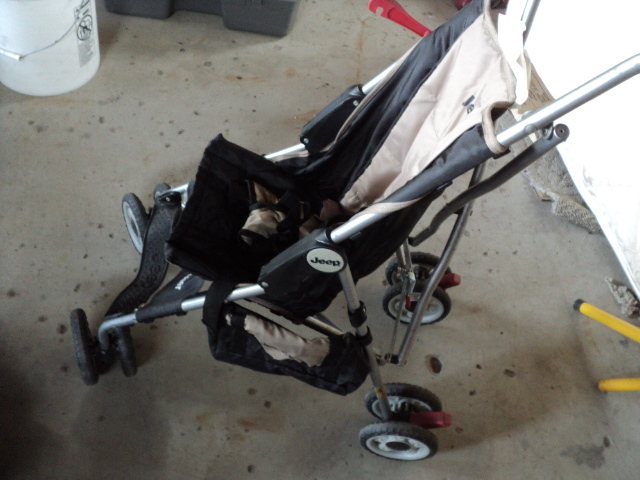 lot 70 image: Jeep stroller...