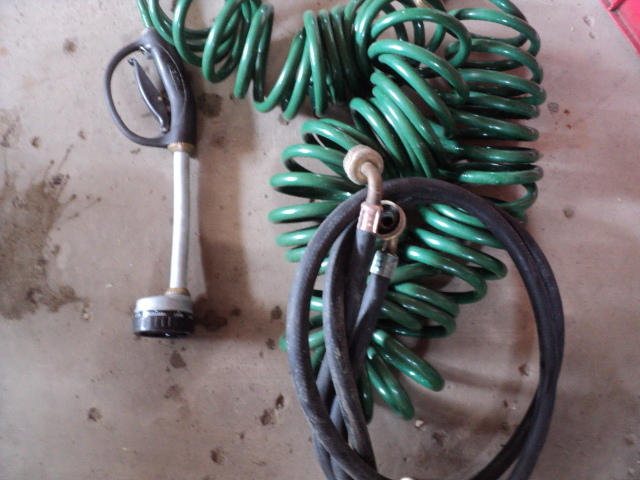 lot 82 image: garden hoses...