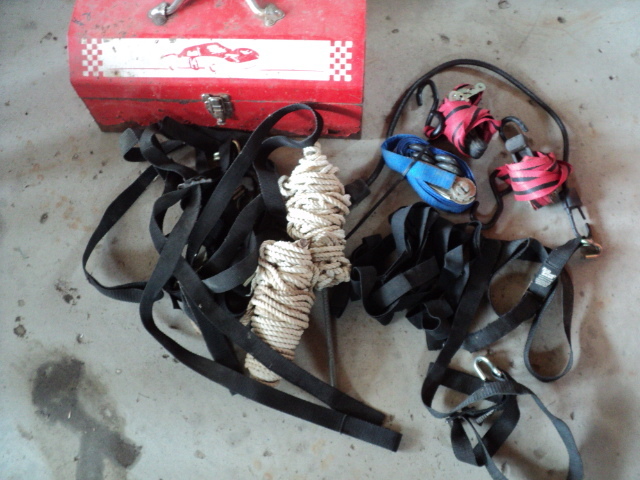 lot 84 image: metal tool box, ratchet straps, and...