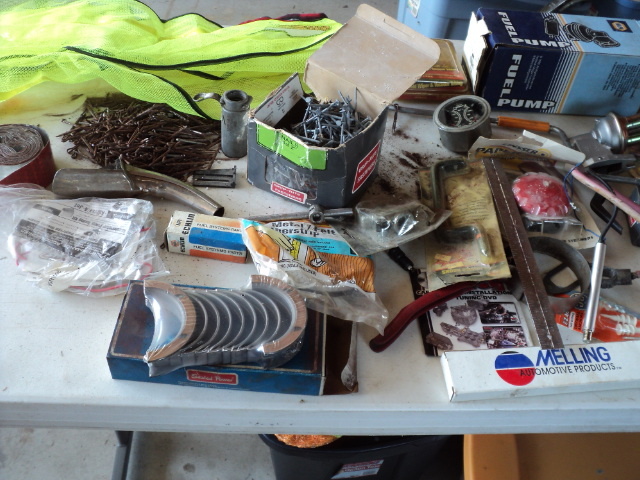 lot 104 image: bucket of cotter pins, nails, fuel ...