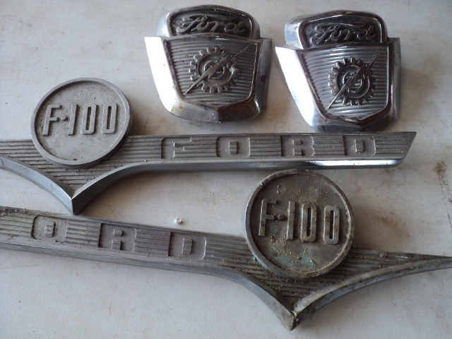 lot 105 image: metal Ford emblems...