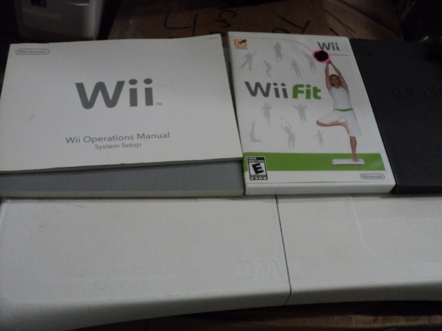 lot 119 image: Wii parts, cases and cables for Win...