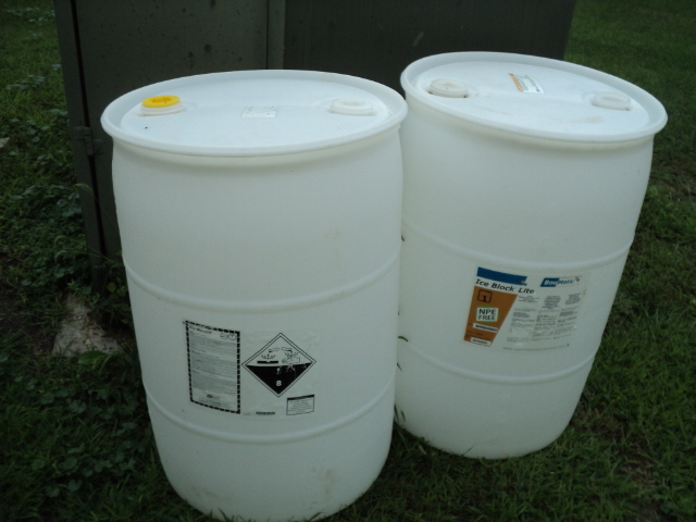 lot 135 image: 2 55 gallon barrels...
