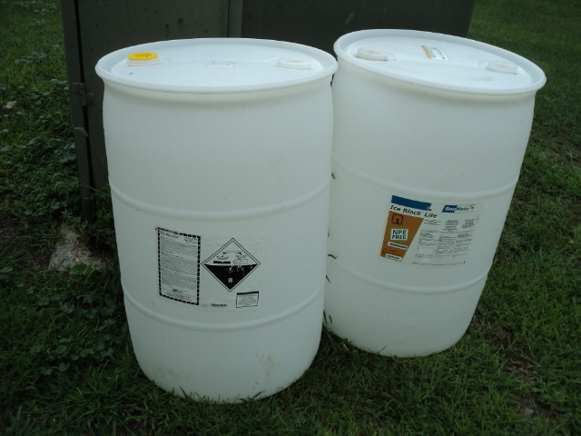 lot 136 image: 2 55 gallon barrels...
