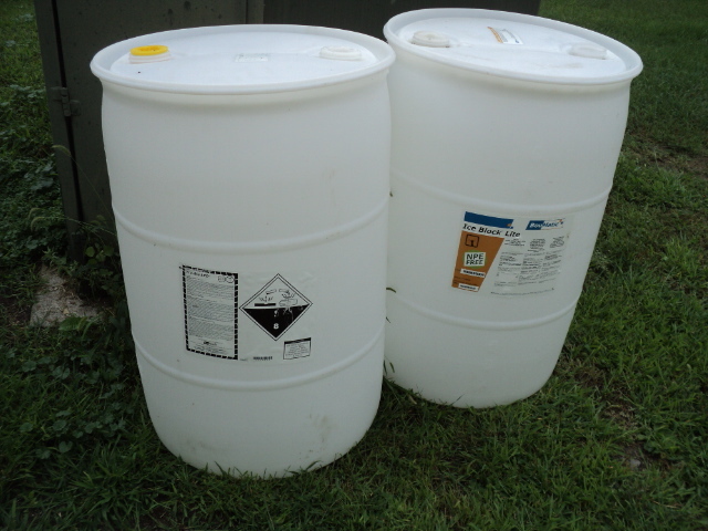 lot 138 image: 2 55 gallon barrels...