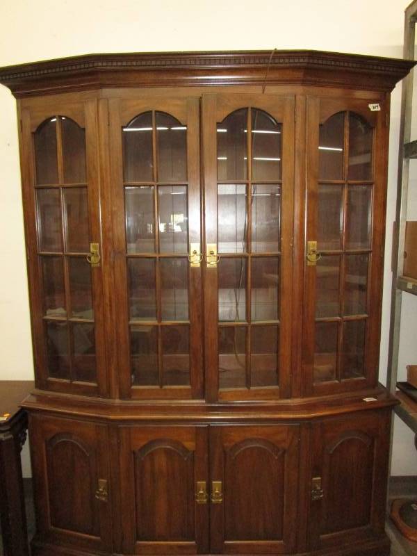 lot 1 image: Two Piece Hutch, glass shelves with plate ledge, drawers and shelves in the bottom.