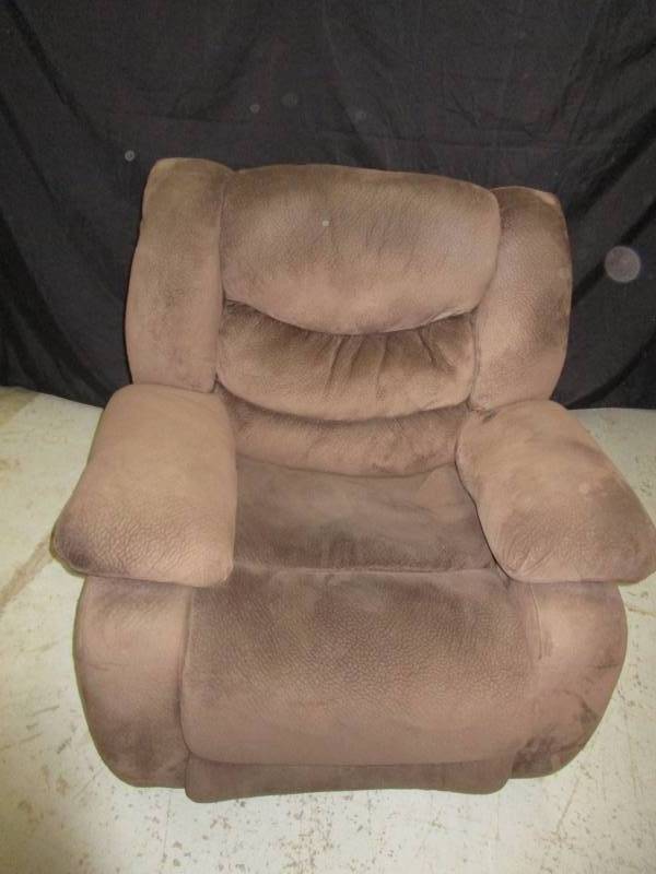 lot 23 image: Nice brown rocker recliner