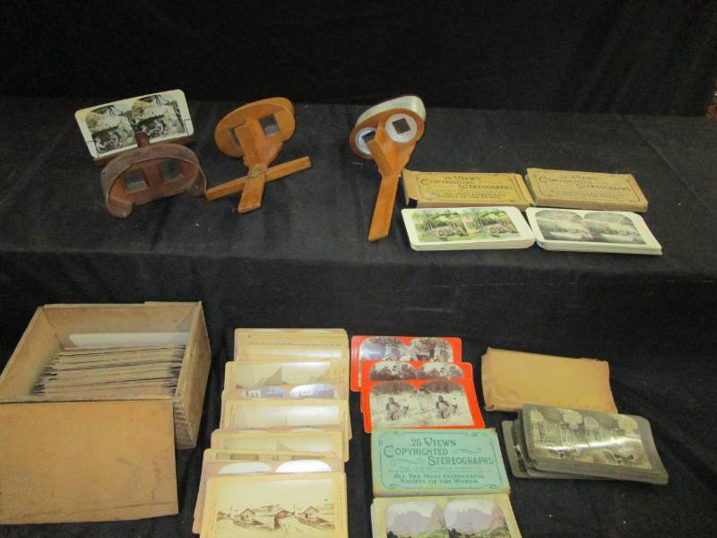 lot 45 image: Three copyrighted Stereographs sights of the world, animals, weddings, over 150 or so and 3 wood stereoscopes and old wood box full