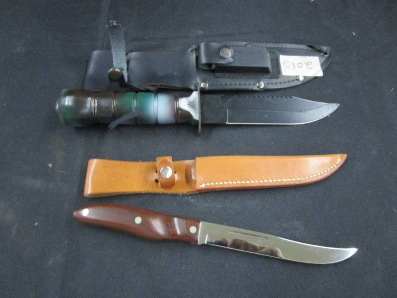 lot 76 image: 2 Knifes. 1 is Twain other is Cutco patan NO. 2390544