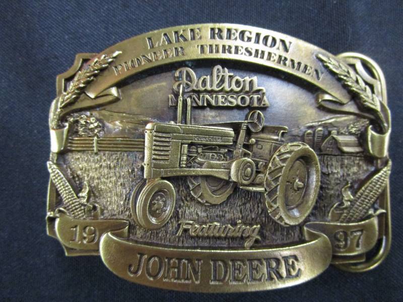 lot 92 image: 1997 Belt Buckle, John Deere, Lake Region Pioneer Threshermans, Dalton Minnesota no.155 of 200