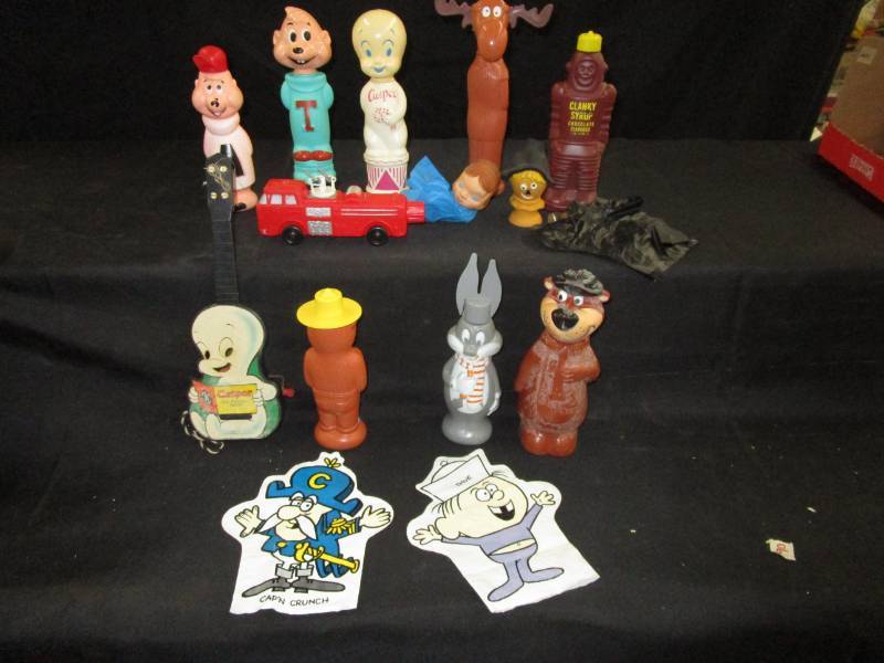lot 93 image: Collectible cartoon character banks and bottles