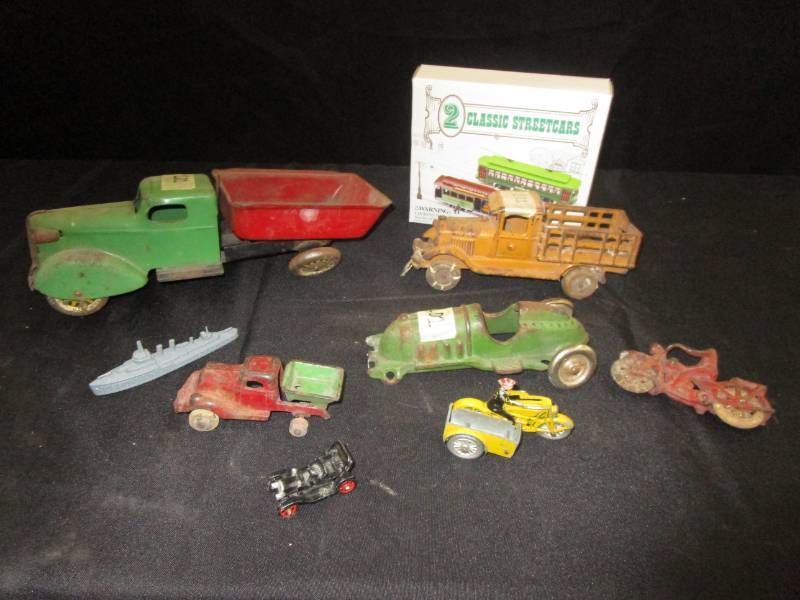 lot 101 image: Old cast iron and metal toys Found the other wheel
