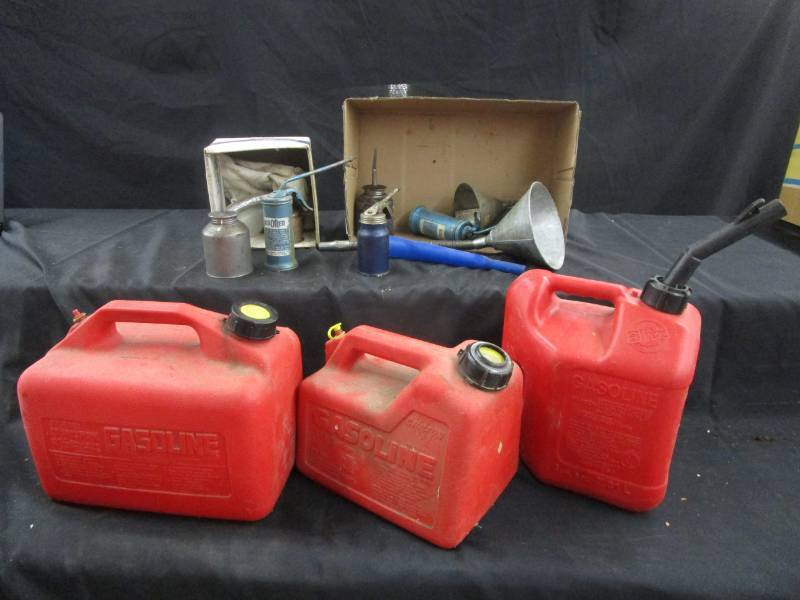 lot 119 image: Gas Cans, funnels, wedge and Oil Cans