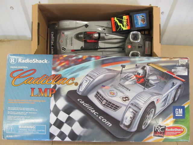 lot 150 image: Working Cadillac Remote Control Race Car wBox
