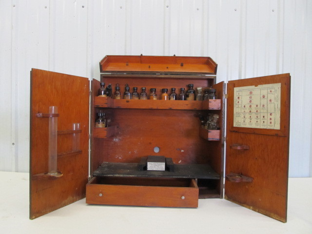 lot 173 image: Original Antique ApothecaryPharmacy Cabinet with Bottles