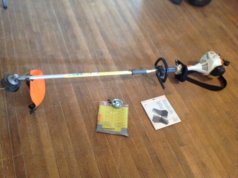 lot 180 image: Stihl KM55R Weed Trimmer