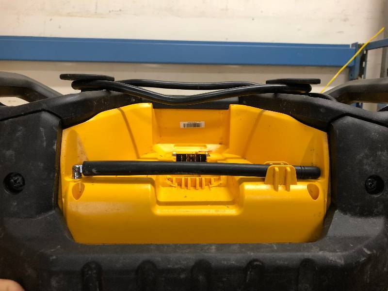 Dewalt 20-Volt MAX or FLEXVOLT 60-Volt MAX Lithium-Ion Battery Charger and Bluetooth Radio used in working conditions