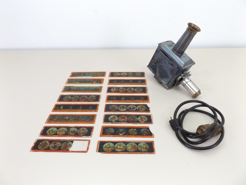 lot 4 image: Antique Germany Magic Lantern with 16 Glass Slides