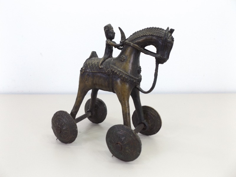 lot 8 image: 11 Brass Antique Aztec Wheeled Horse and Rider Statue