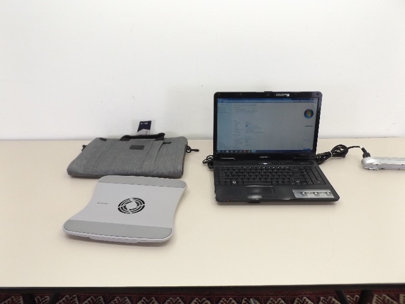 lot 84 image: WORKING UNLOCKED eMachines Laptop, Case and Extras