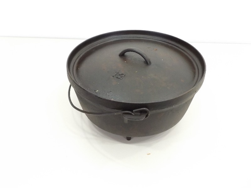 lot 96 image: #12 Cast Iron Footed Dutch Oven