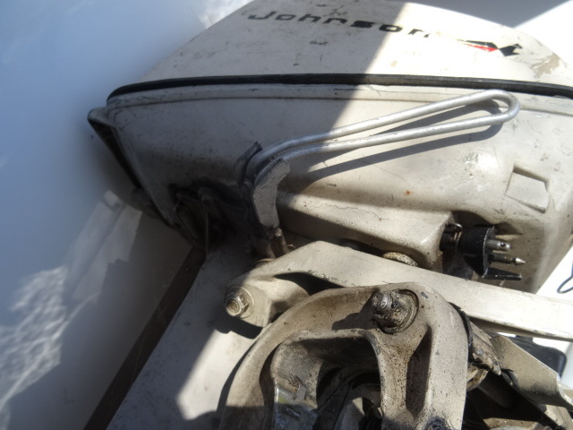 lot 27 image: Johnson Outboard motor with tank. E...