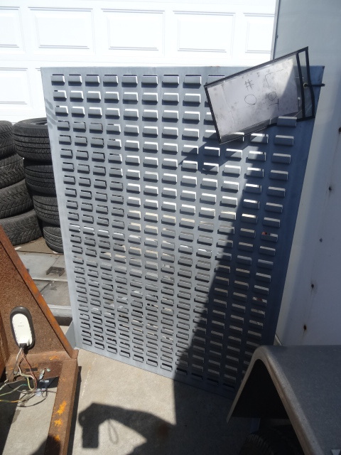 lot 44 image: Hardwrae bins with metal rack for h...