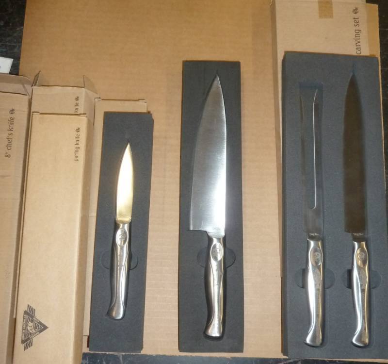 lot 60 image: Carving knife and fork, chef knife and 3 paring knives - fishing theme, different fish etched in the handles of each one