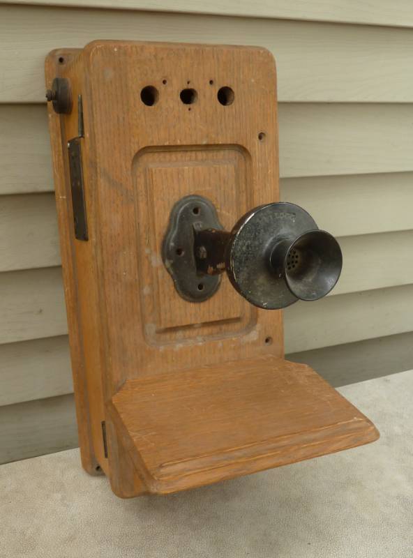 lot 104 image: antique telephone