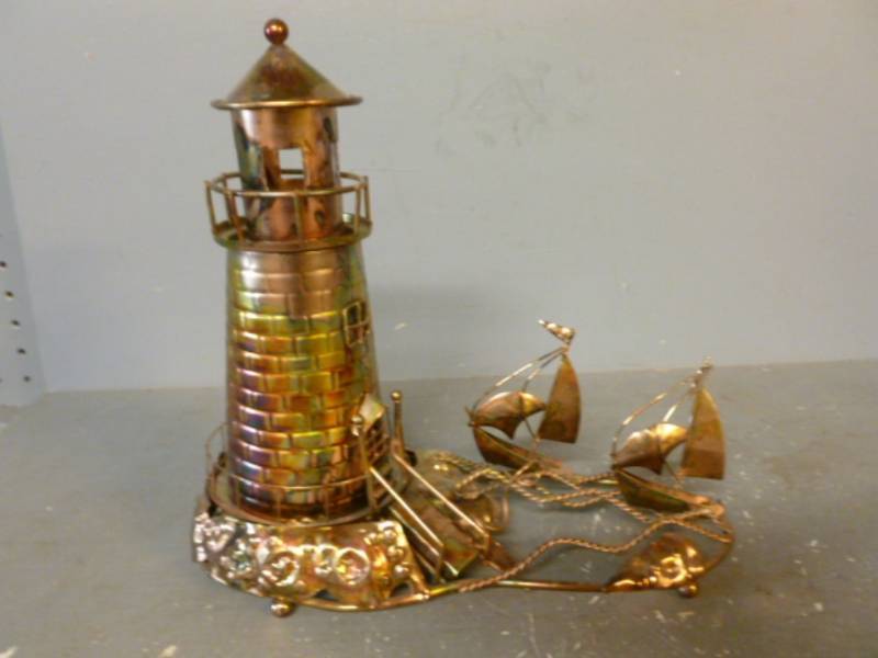 lot 112 image: Cut Metal Music Player