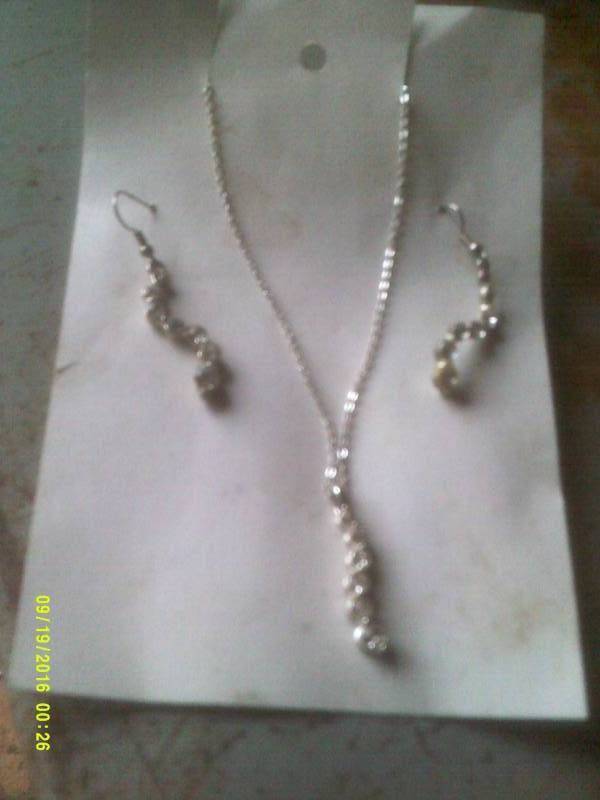 lot 10 image: SILVER AND DIAMOND EARINGS AND NECKLACE